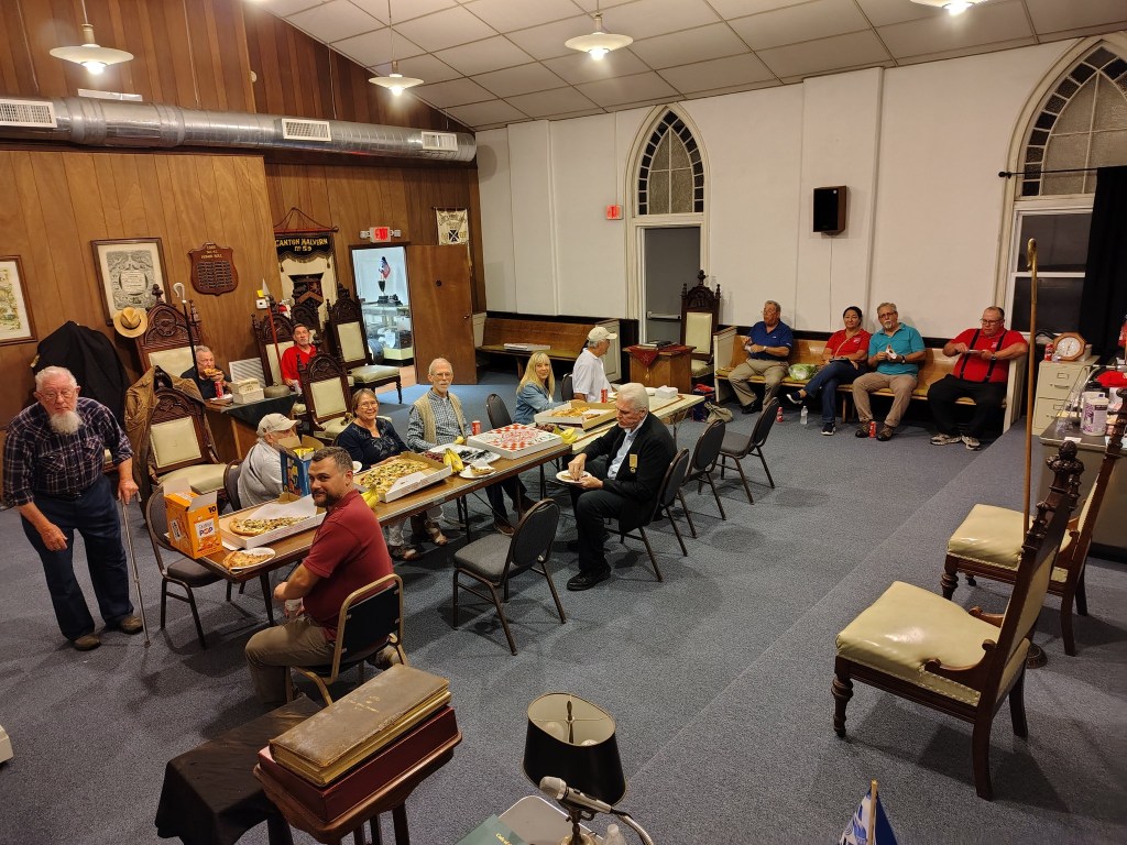 Officer installation ceremony in the Lodge building